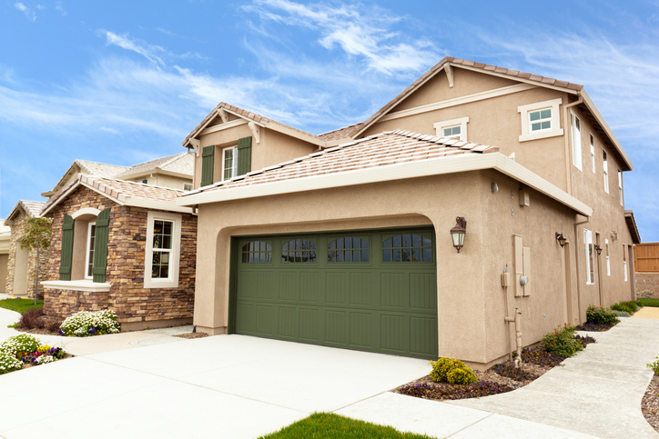 How a Garage Door Designer Balances Functionality and Aesthetic Appeal